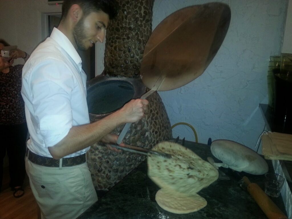 Sepehr working cash-in-hand for a kebab shop.
